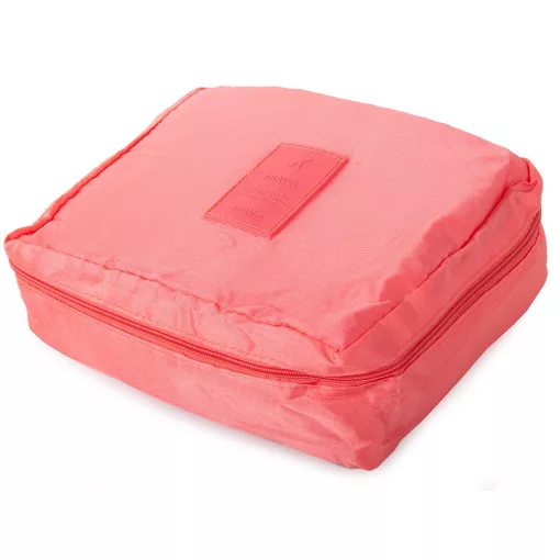 Lazac színű utazó kozmetikai táska nyitott állapotban, látható belső rekeszekkel és rendszerezővel