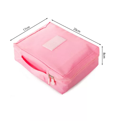 Rózsa színű utazó kozmetikai táska / turista rendszerező táska nyitott állapotban, látható belső rekeszekkel és cipzárral