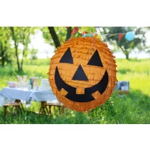 Vigyorgó narancssárga halloweeni tök alakú party pinata bulikra!
